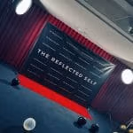 Step and repeat banner with red carpet