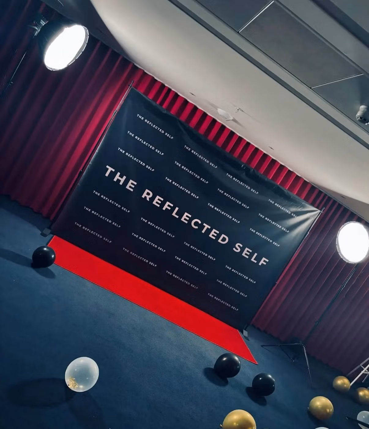 Step and repeat banner with red carpet