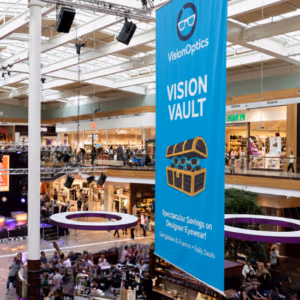 Large custom printed cloth banner used as a non-reflective backdrop for a trade show exhibition stand