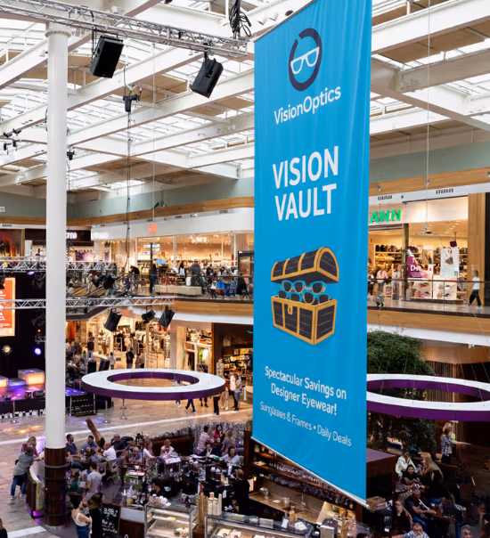 Large custom printed cloth banner used as a non-reflective backdrop for a trade show exhibition stand