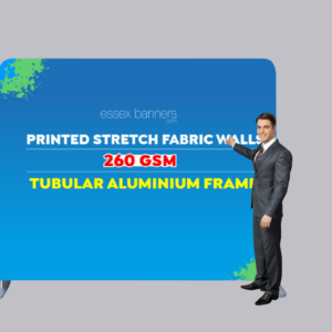 man stood in front of step and repeat stretch fabric banner