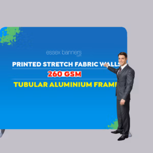 man stood in front of step and repeat stretch fabric banner