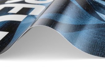 A colorful custom-printed PVC vinyl banner